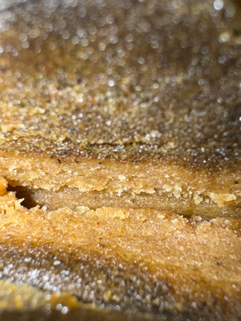 Résine CBD Oreoz 60% — texture dense arômes biscuités terreux et poivrés